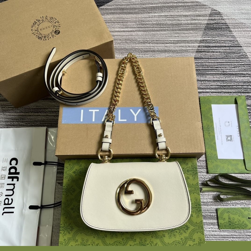 G*u*i top handle bags